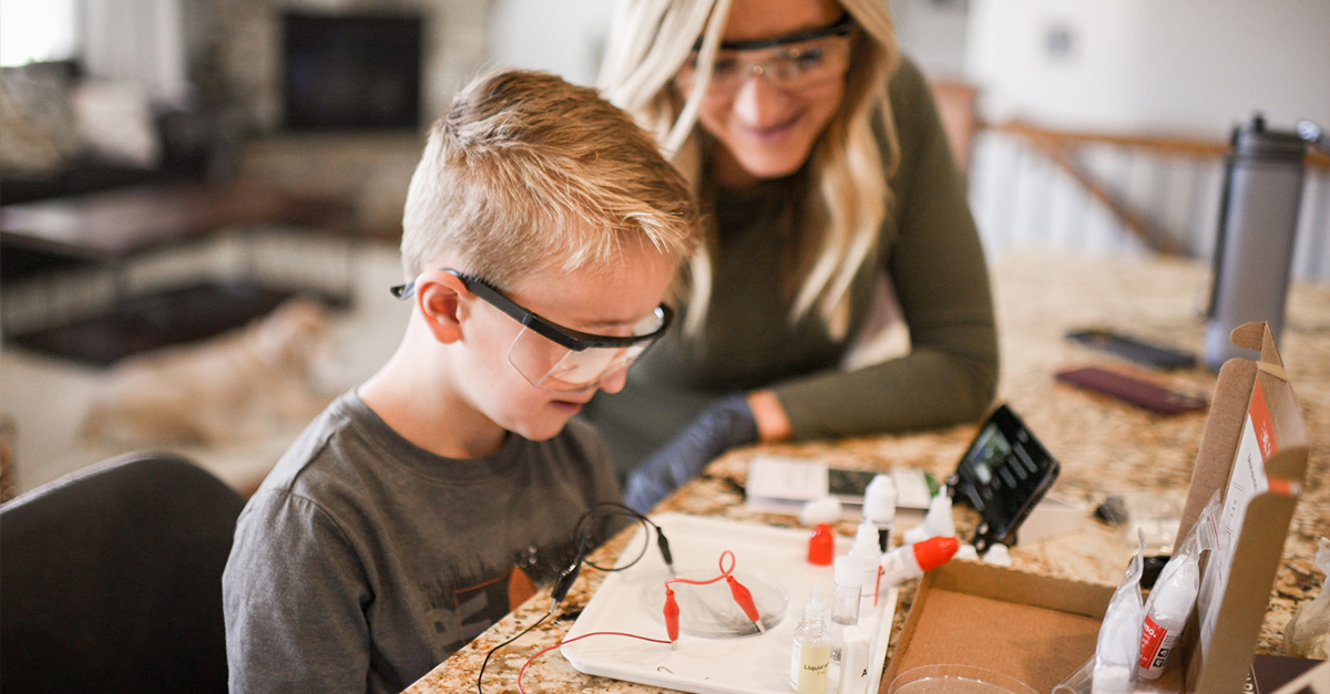 A child exploring a STEM kit