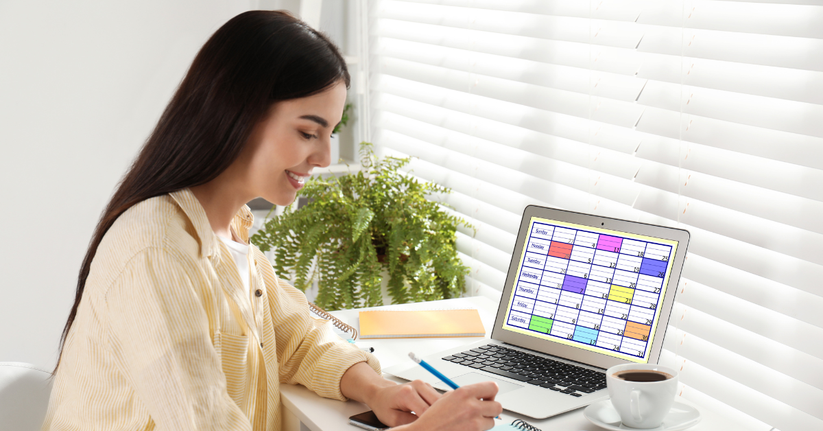 Woman reviewing her calendar on a laptop, planning around the IRS Refund Schedule Calendar 2025 for efficient tax filing