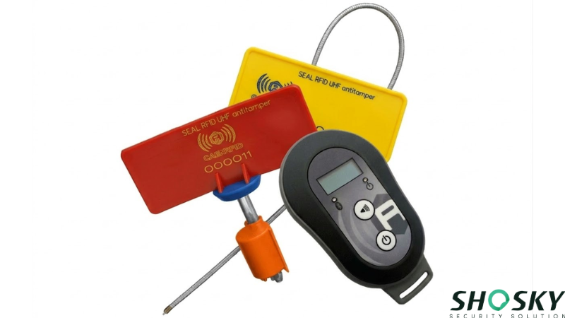 Industrial RFID anti-tamper tags shown with a portable reader device