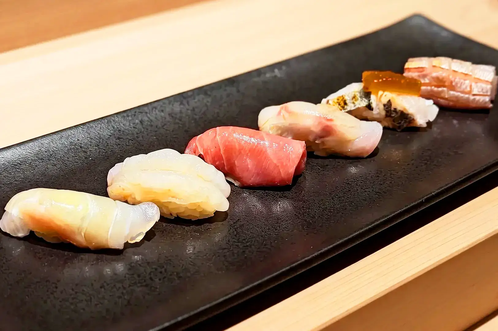 Traditional Japanese sushi dining experience at Sushi Kimura Plus Conrad Singapore Orchard with elegant counter-style restaurant interior