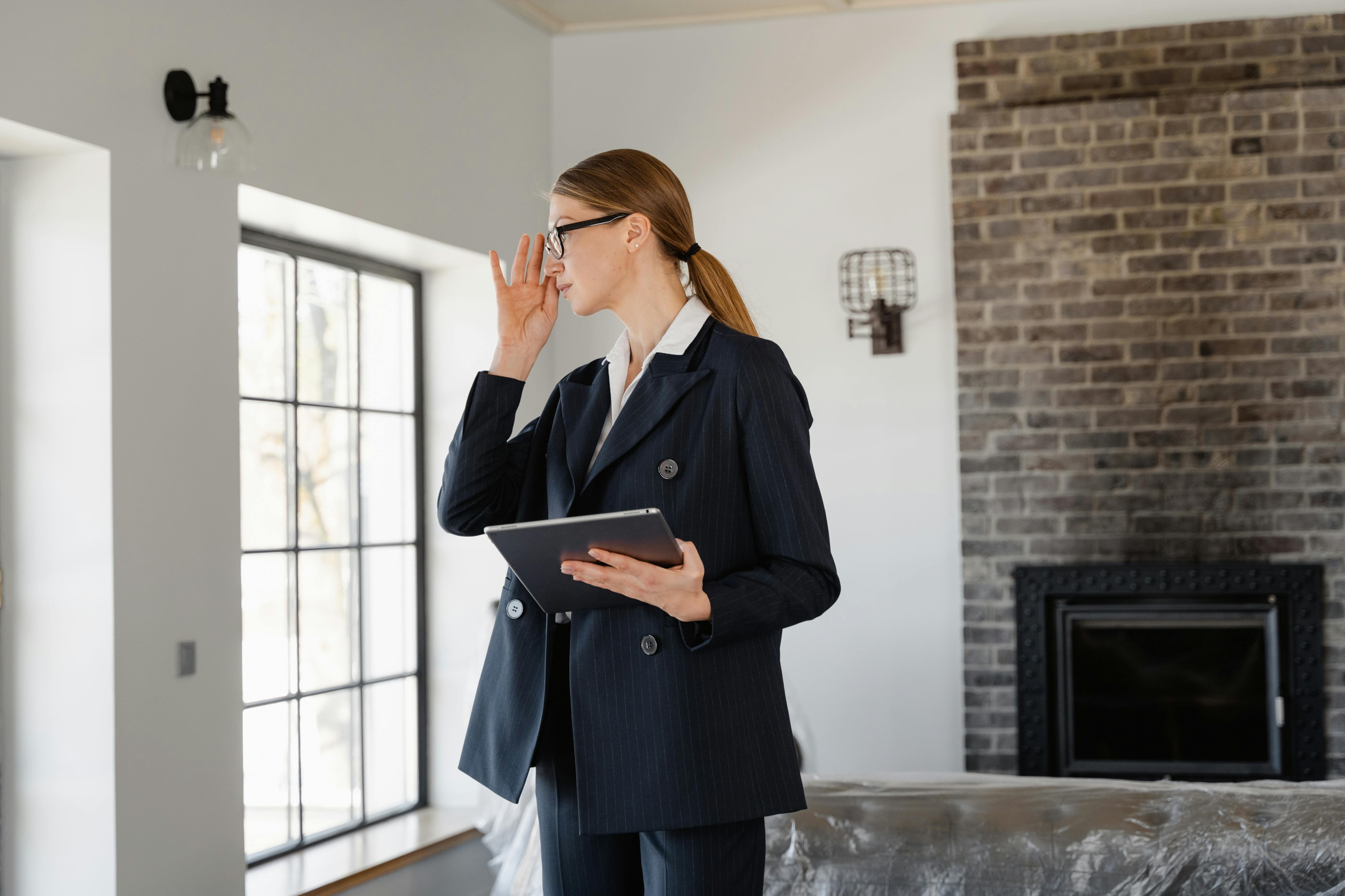 Real estate wholesaler walks through home she plans on getting under contract.