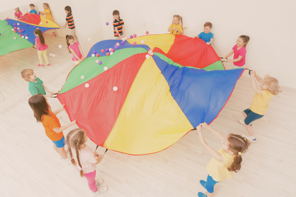 Children playing a parachute game