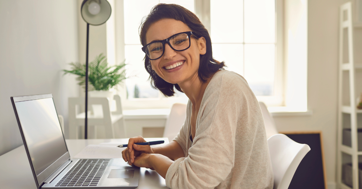 A woman reading about new 1099 rules OnlyFans