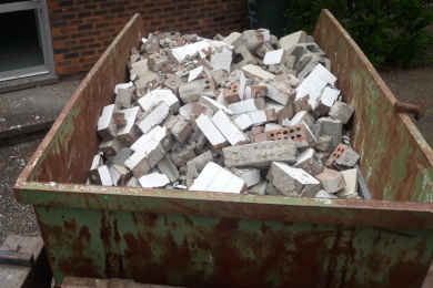 hire a skip bin for disposal or recycling of heavy materials like bricks and concrete from builders activities