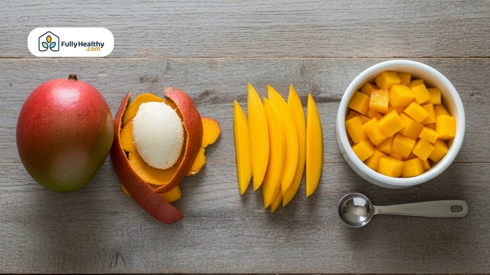 Mango shown whole, peeled, sliced, and cubed beside metal measuring spoon