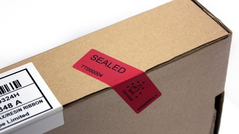 E-Commerce packaging with a red security label