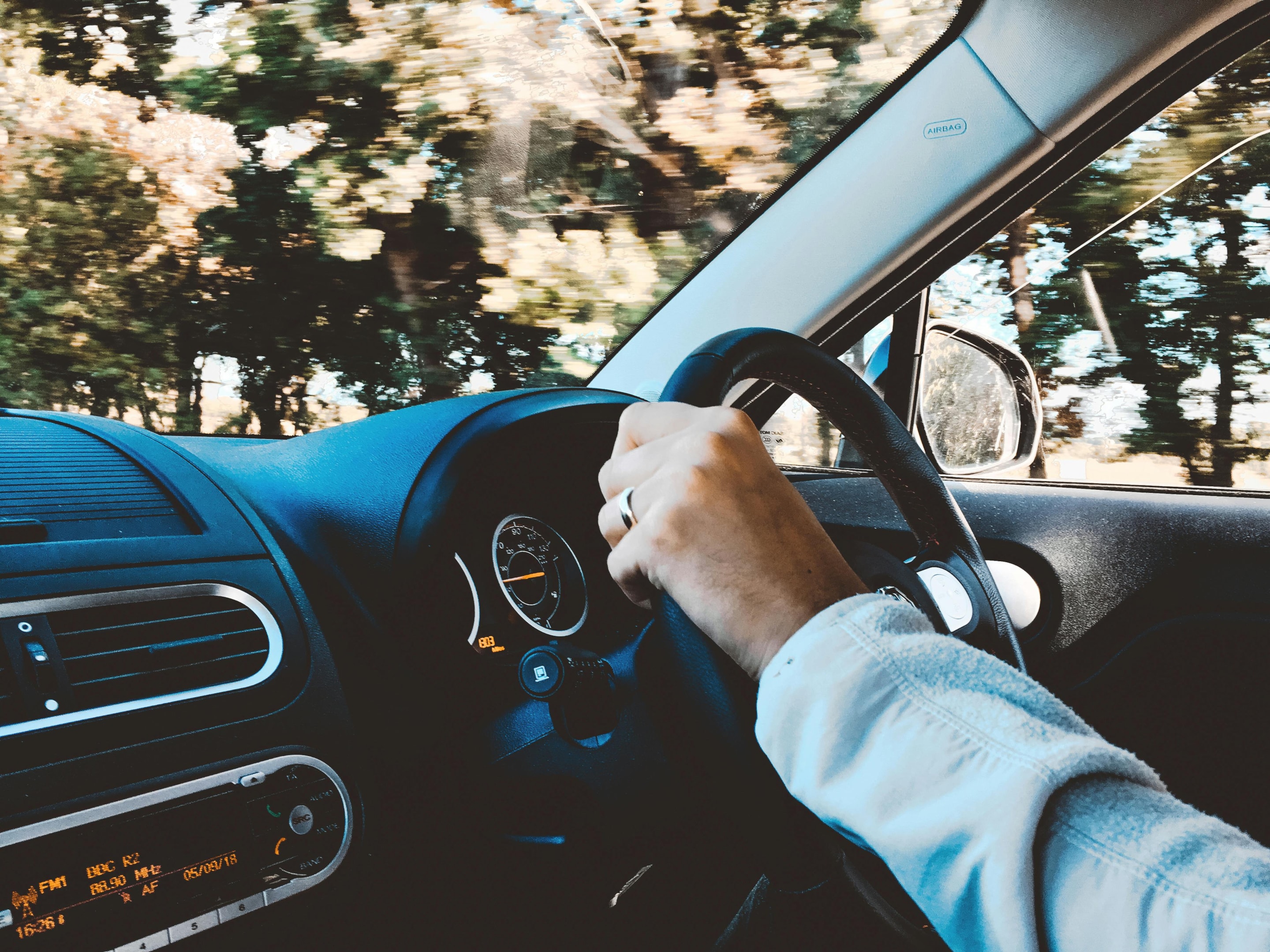 Real estate agent drives around neighborhoods looking for abandoned properties. 