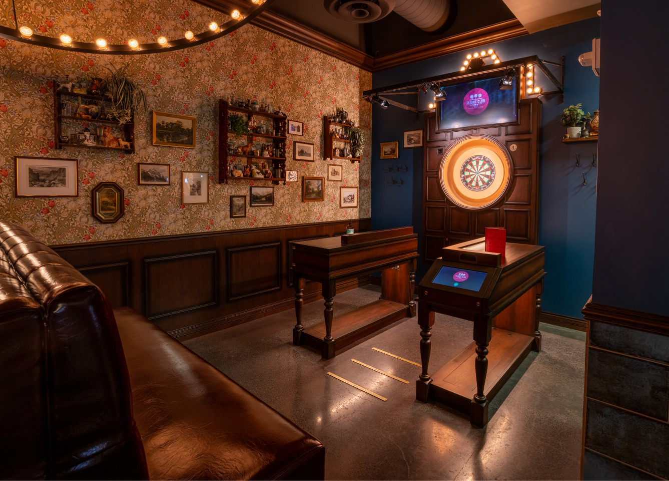 The interior of Fight Club Social Darts Denver, featuring an oche 