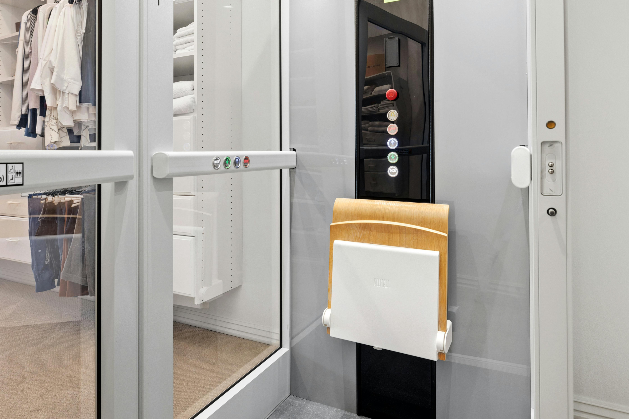 An example of a platform lift leading up to a wardrobe.