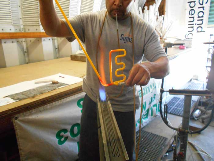 Dave's Signs does more than sign installation. Here is a neon sign being made at our on-site neon facility.