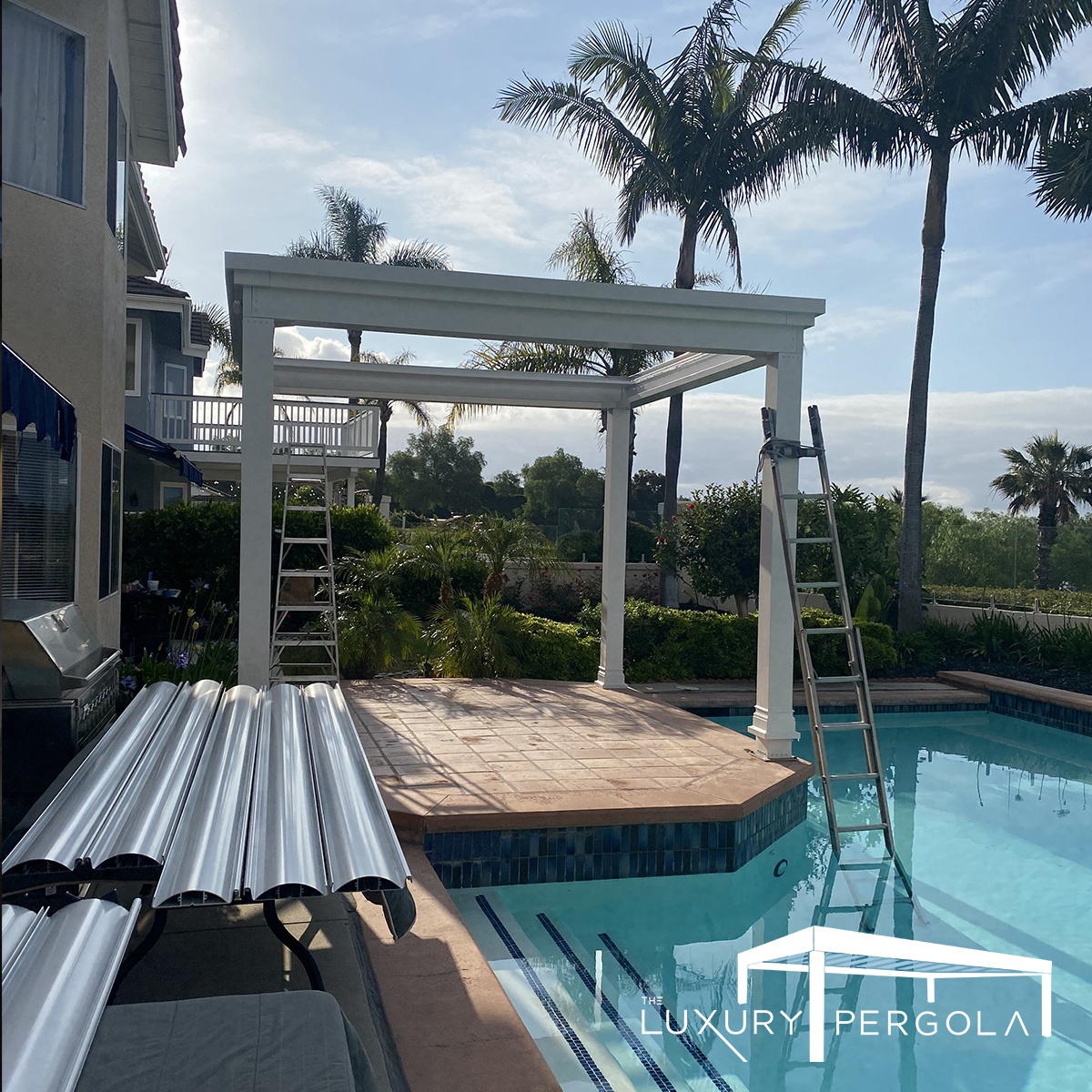 A pergola with anchors to increase wind resistance