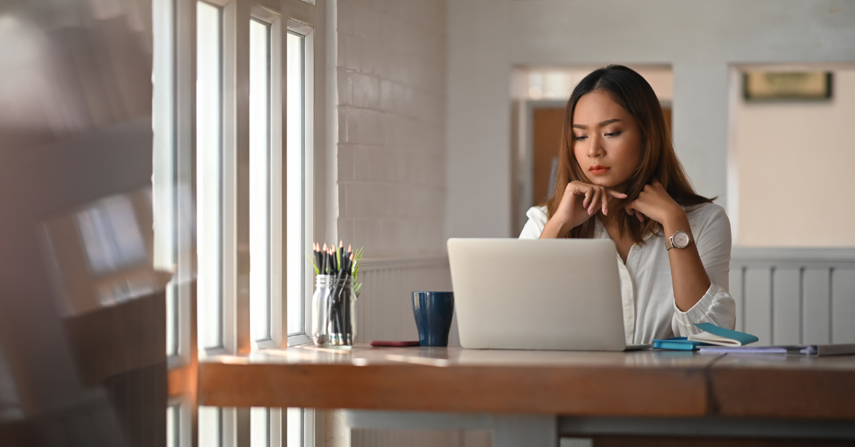 A woman tracking OnlyFans tax write offs