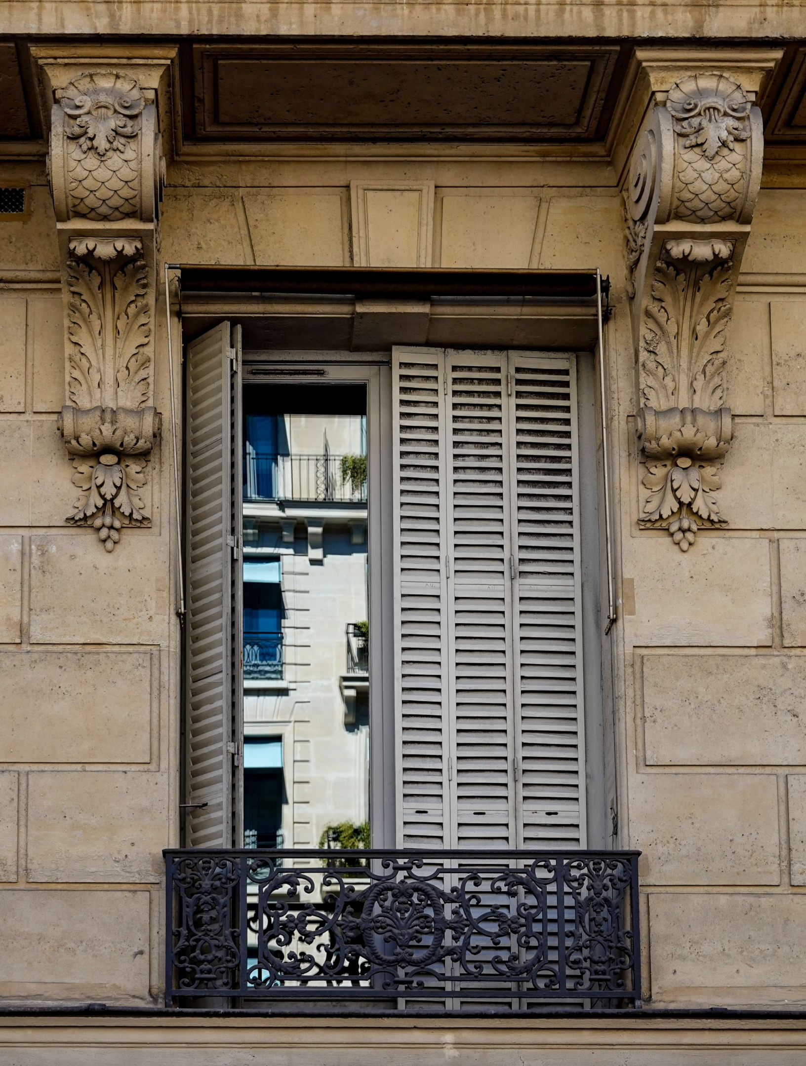 Corbels supporting an external overhang which creates shade from the midday summer sun 