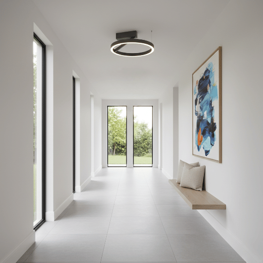 Modern LED ring pendant bringing balanced light and openness to contemporary hallways.