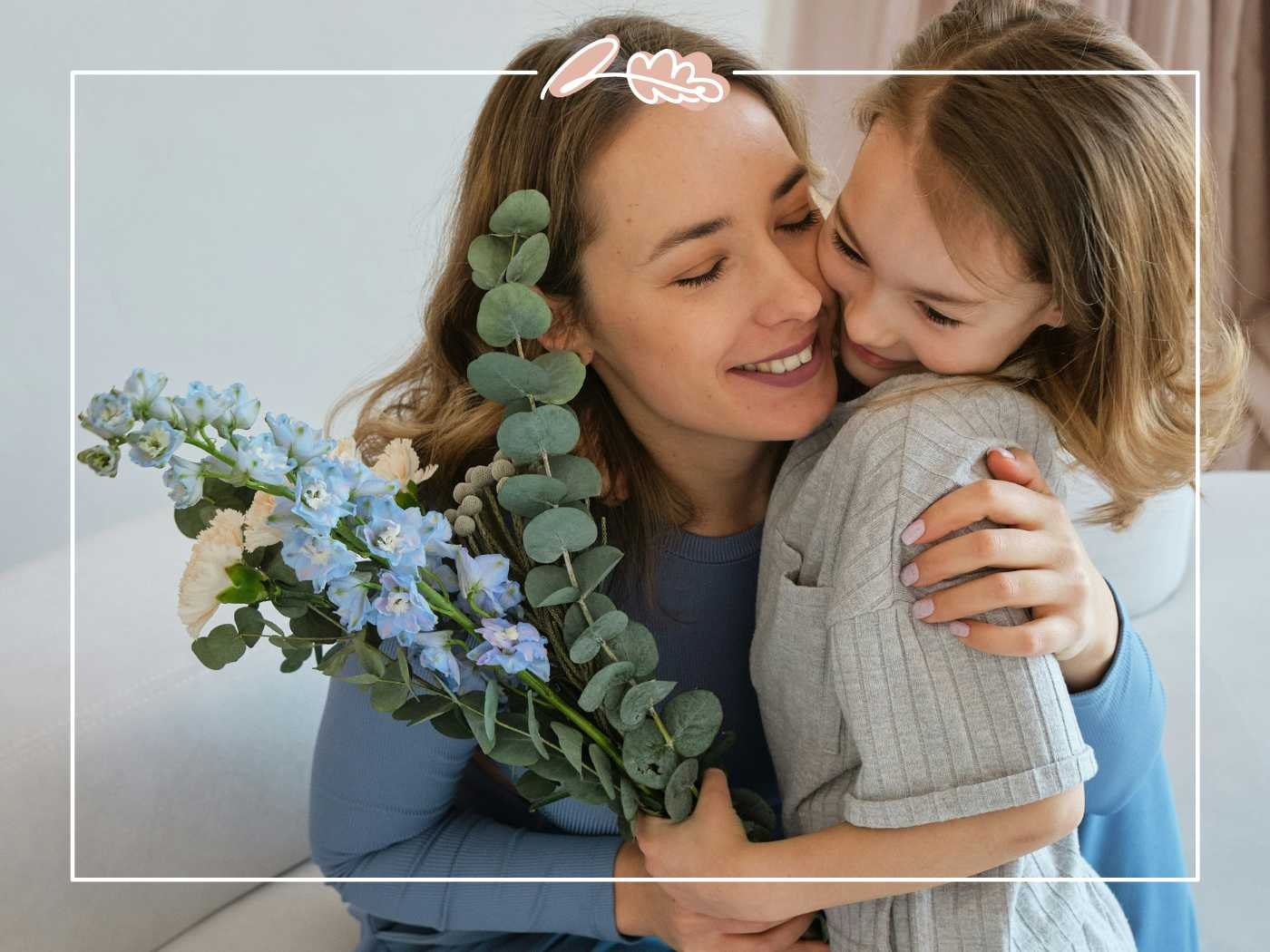 Mother and daughter sharing a heartfelt moment with flowers by Fabulous Flowers and Gifts