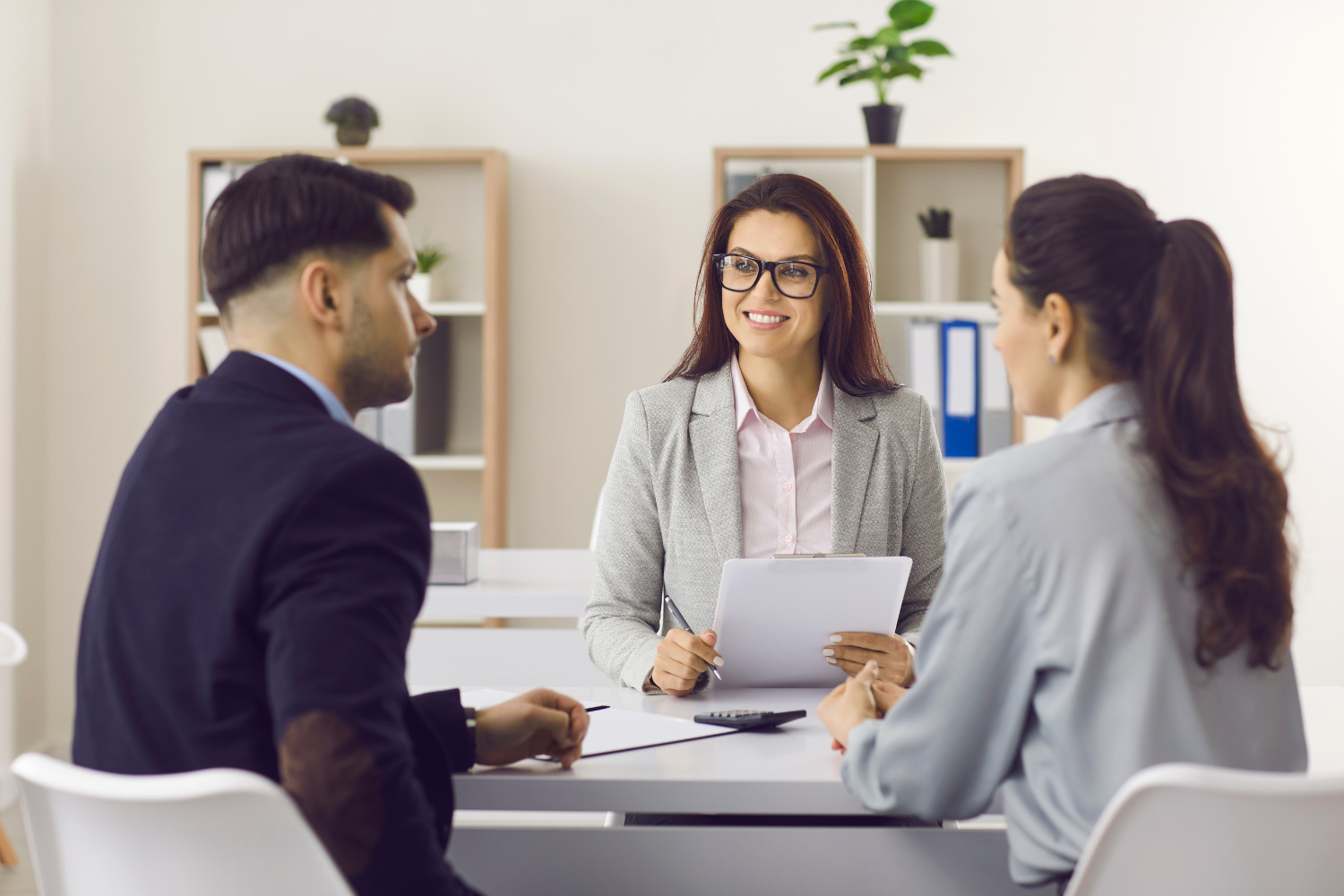 A broker and two business owners.