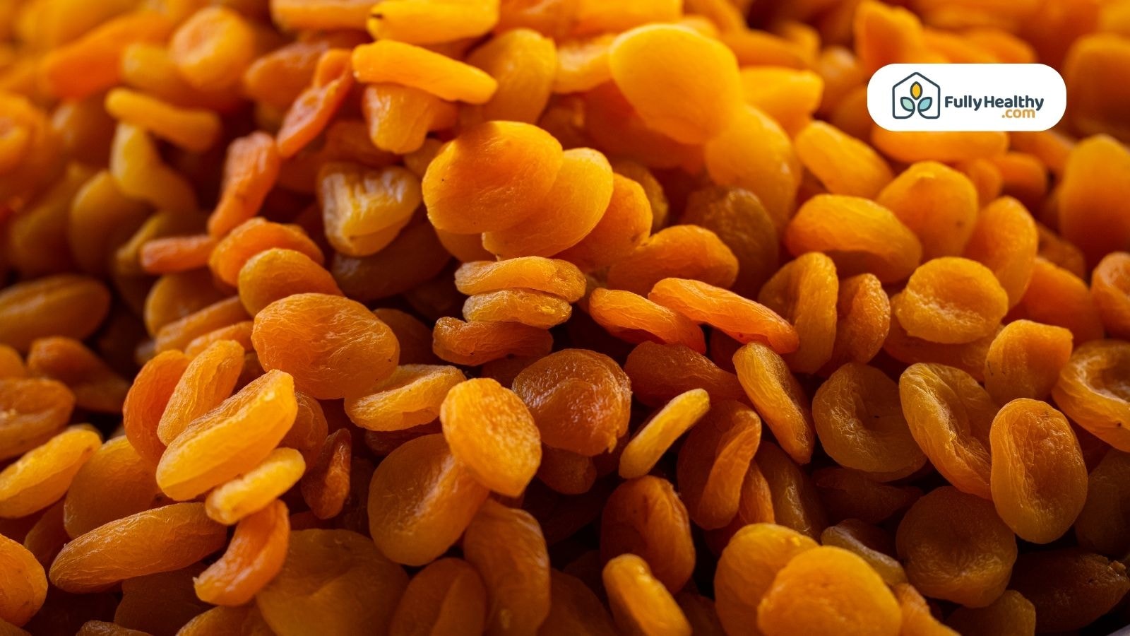 Dried apricots arranged in a pile