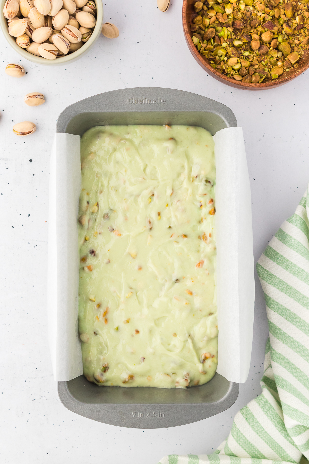 unbaked pistachio loaf bread in loaf pan