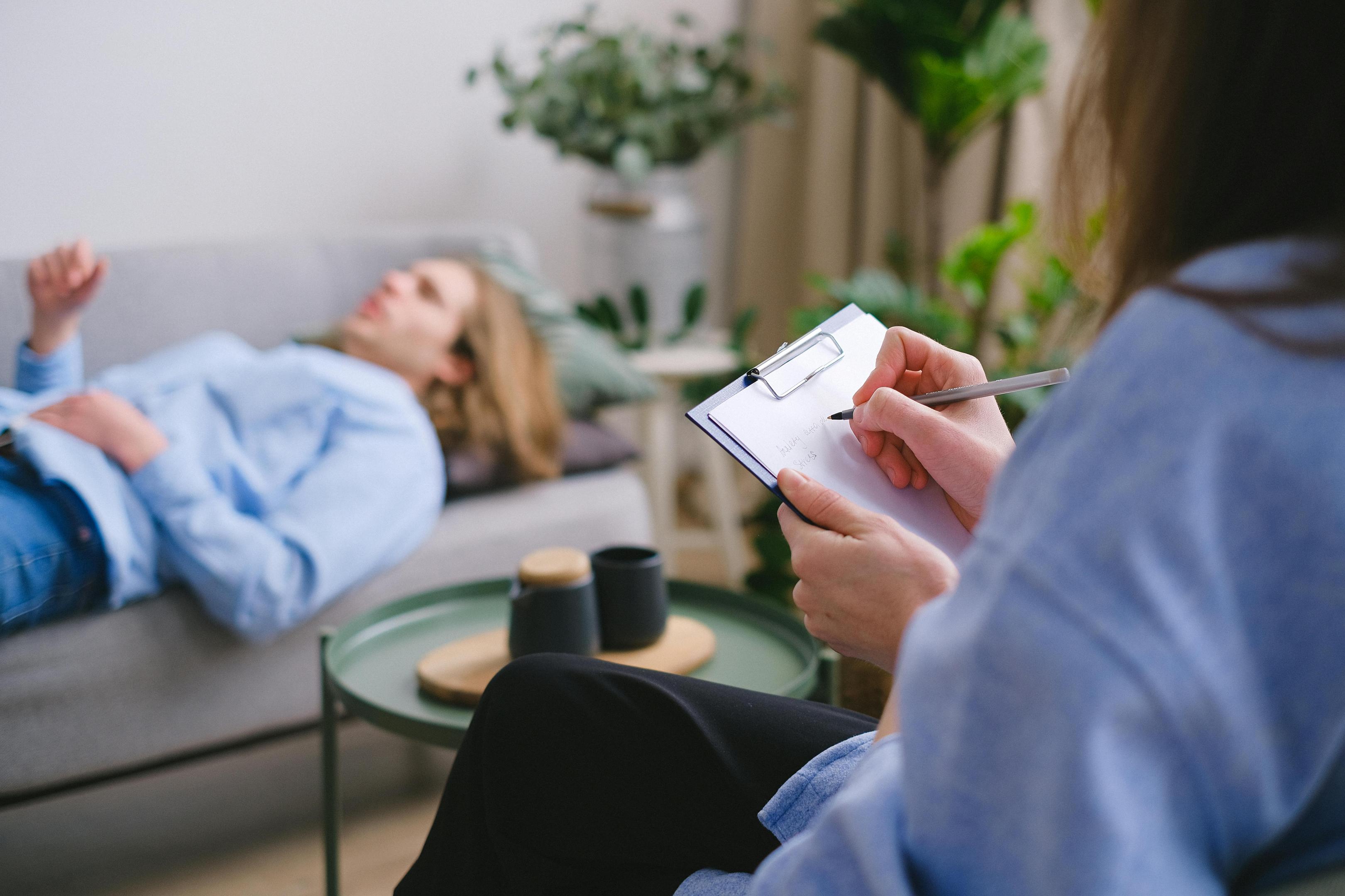 Therapist assesses patient, answering the question how much does ketamine therapy cost