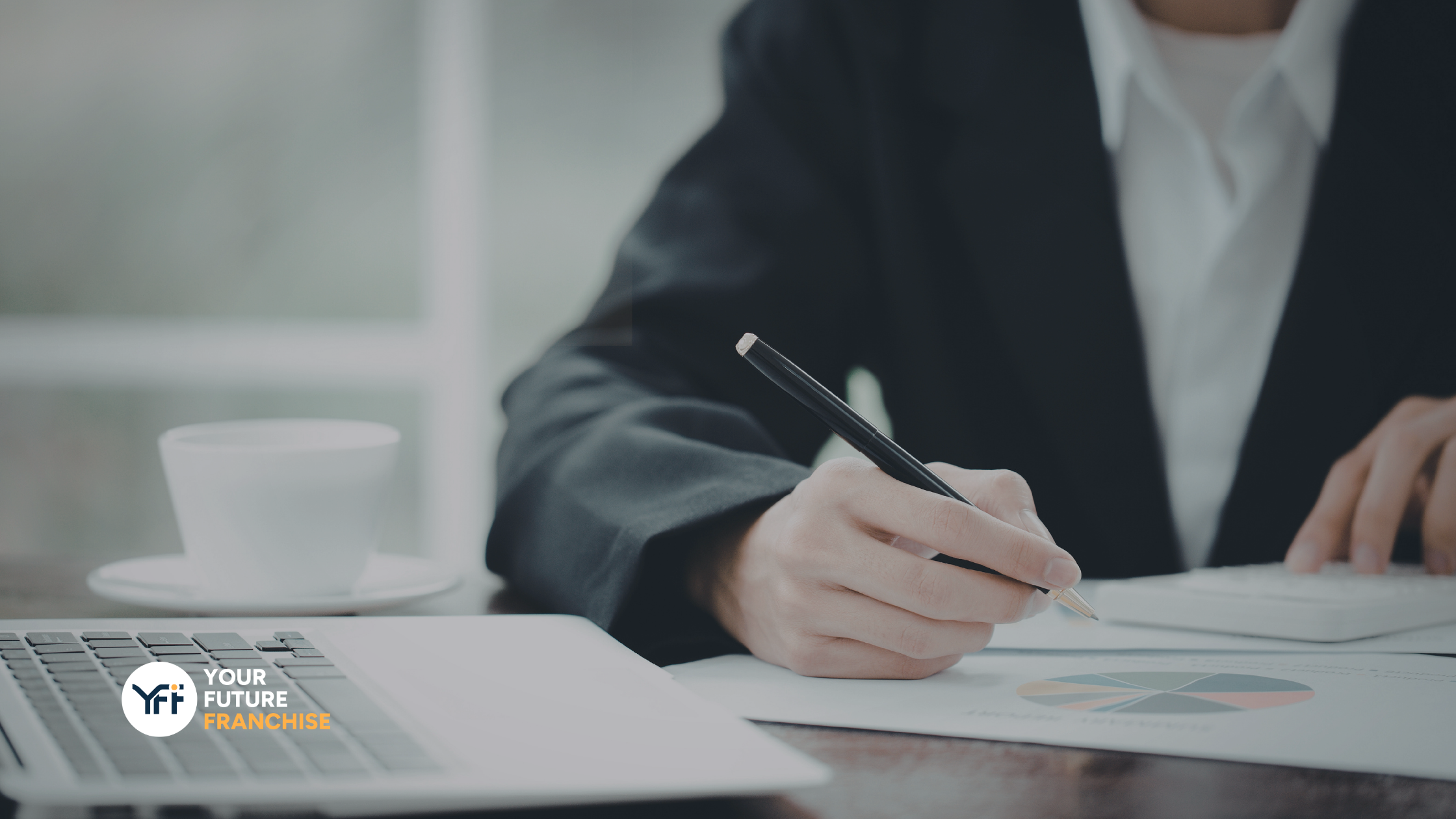 A businessman reading franchise law to understand franchise ownership 