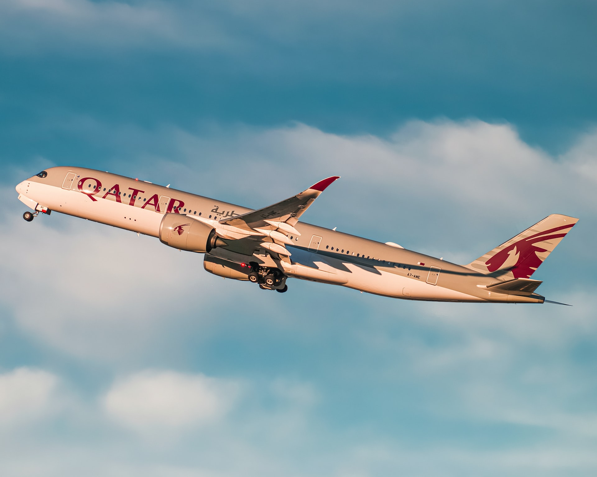 Qatar Airways aircraft taking off, the best airline to work for as a flight attendant.