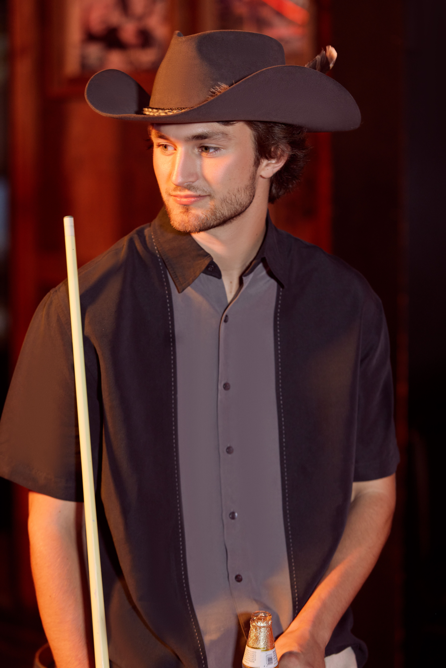 cowboy with pool stick