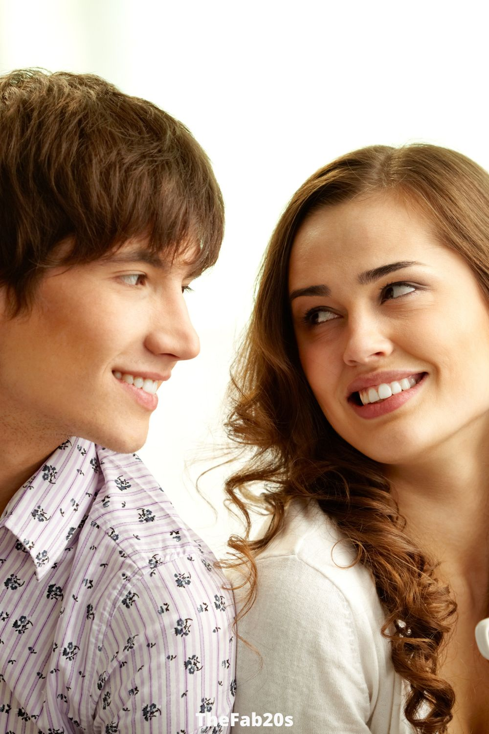 Man and woman looking fondly in each others eyes - Signs A Married Man Likes You But Is Hiding It