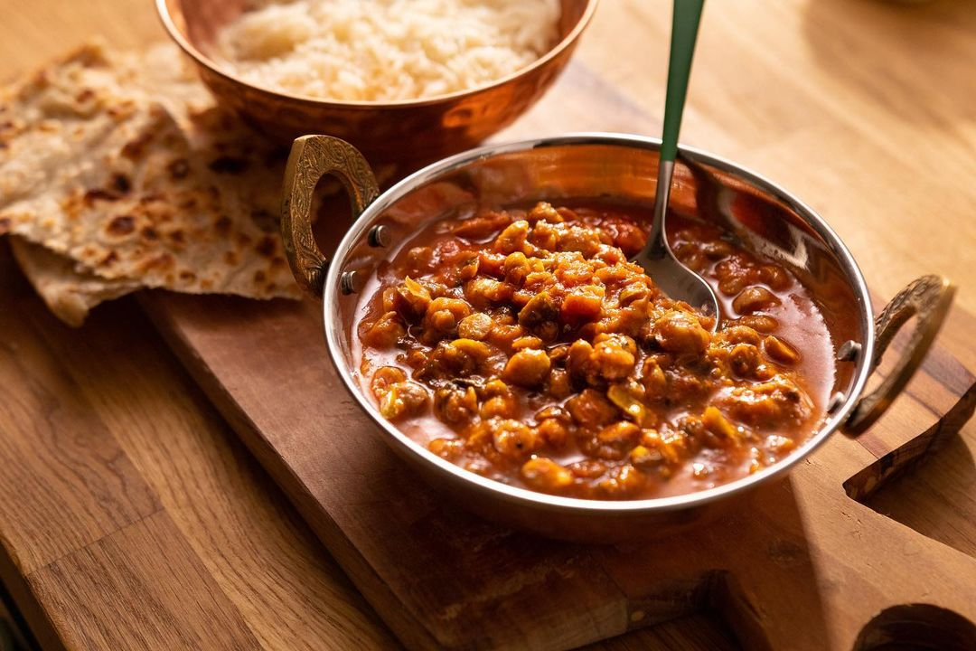 A plate of a filling meal with savory sauce