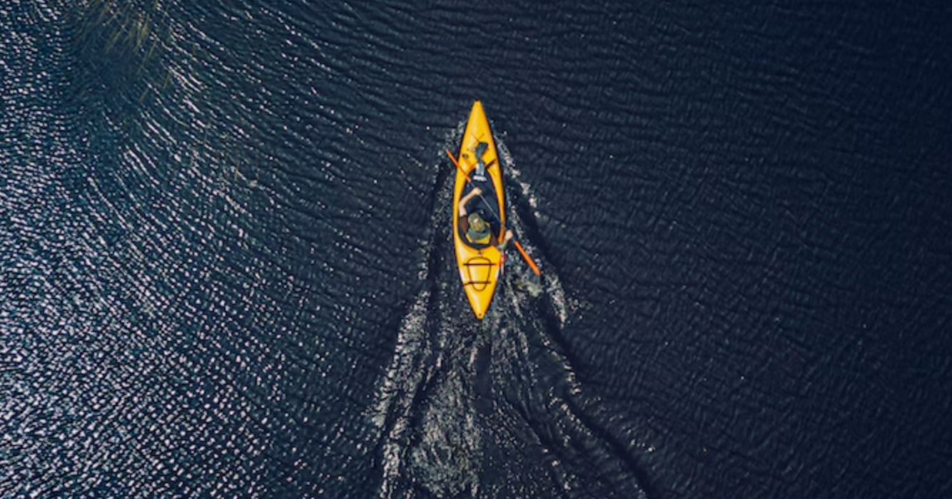 fishing kayak on flat water