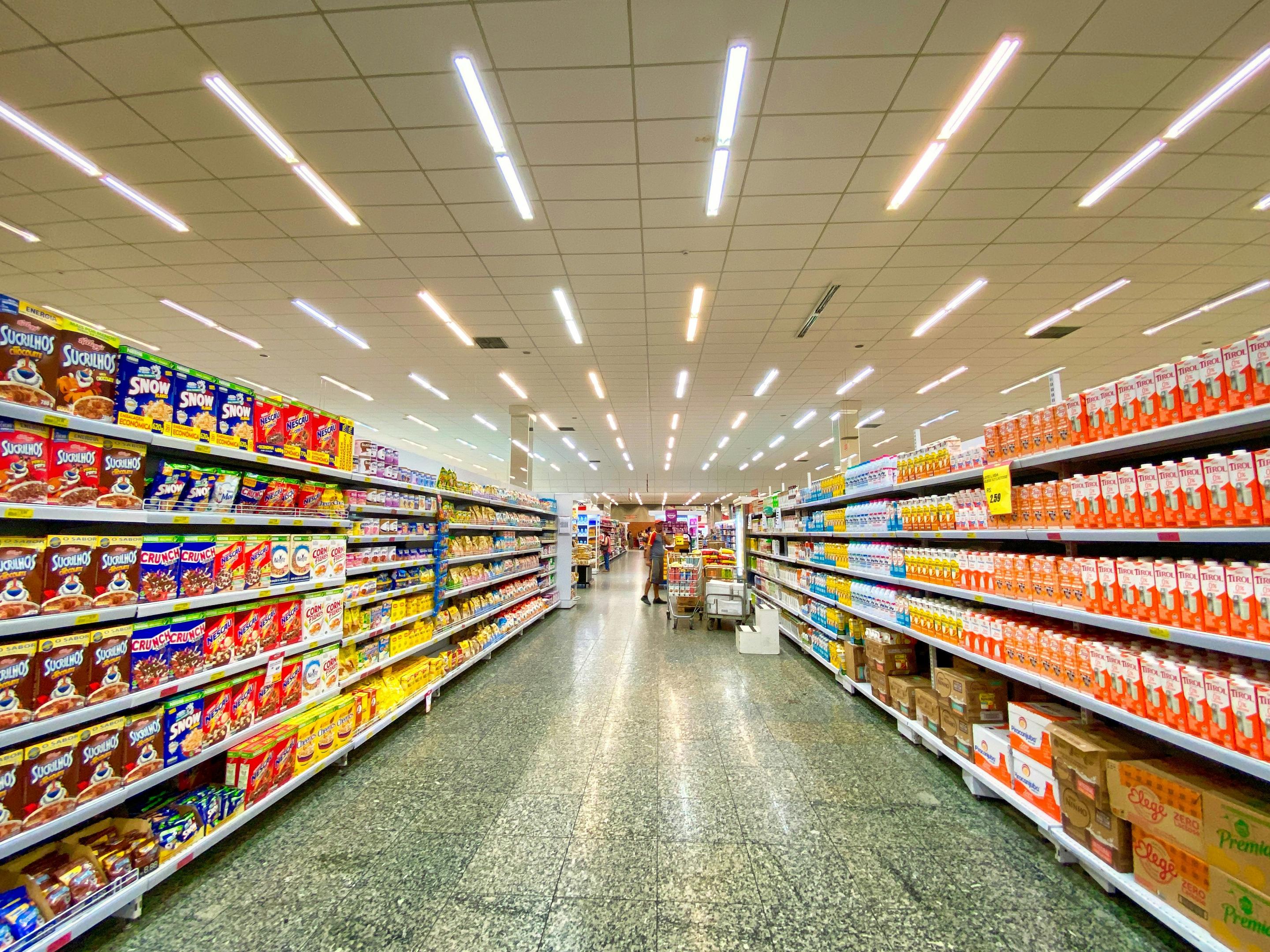 Grocery aisle with food choices.