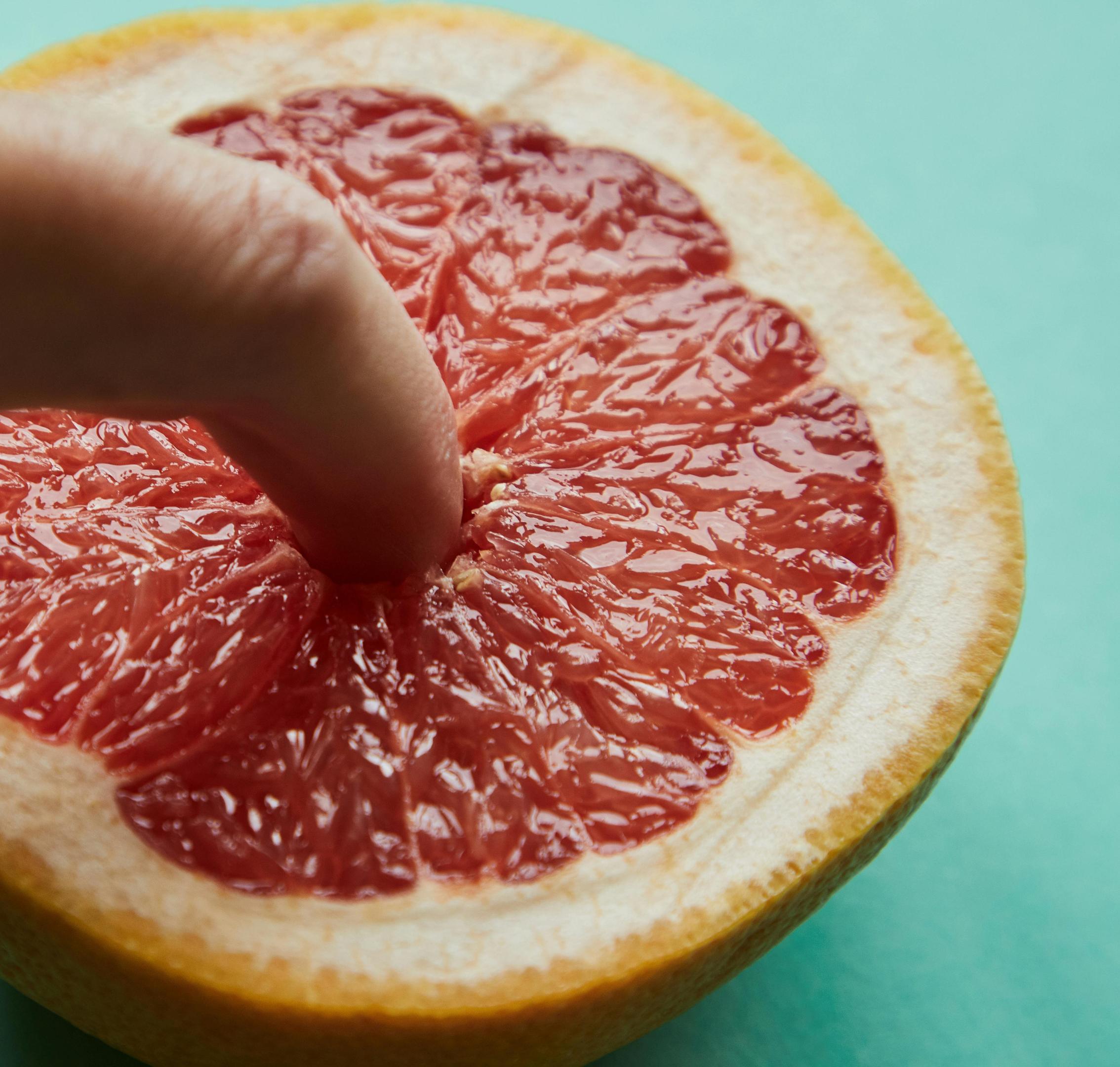 Massaging the area between the vagina