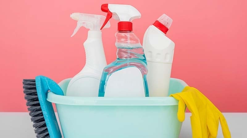 A tub full of cleaning supplies