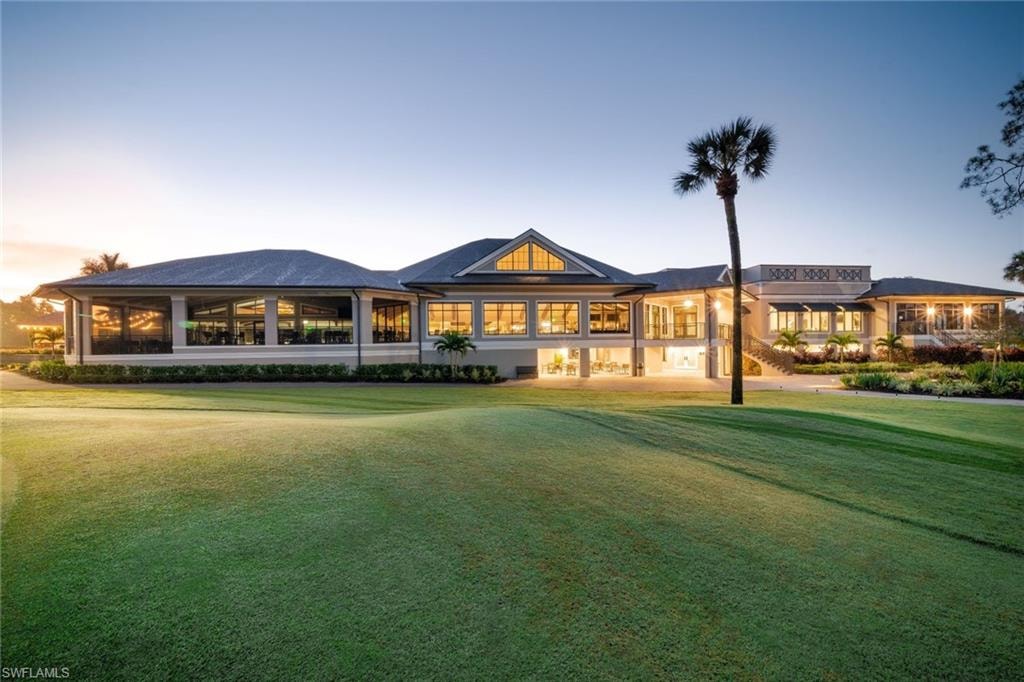 An aerial view of The Forest Country Club in Fort Myers, FL, showcasing lush golf courses and luxurious homes nestled among mature trees, highlighting the community's access to outdoor recreation and upscale amenities. This picturesque scene reflects the allure of properties available in this gated community for prospective property consumers.