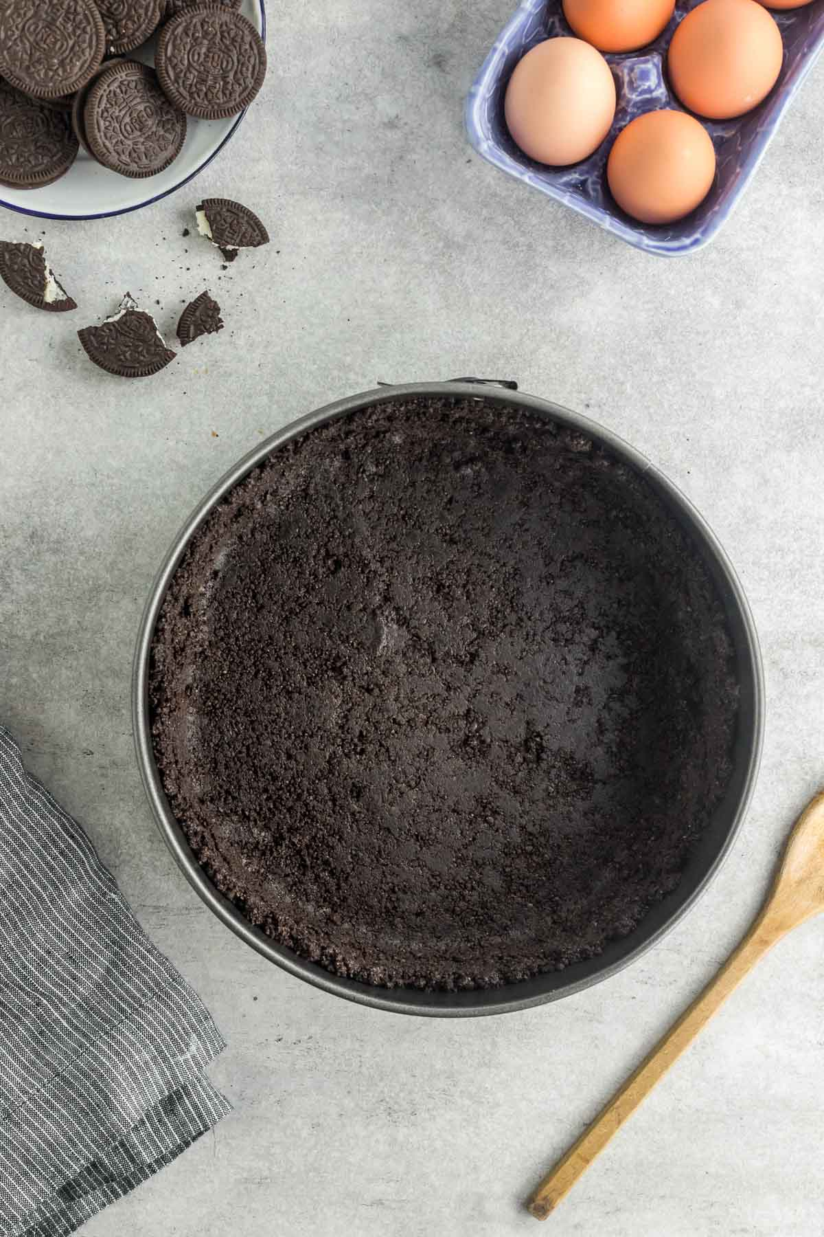 Oreo cookie crust in springform pan