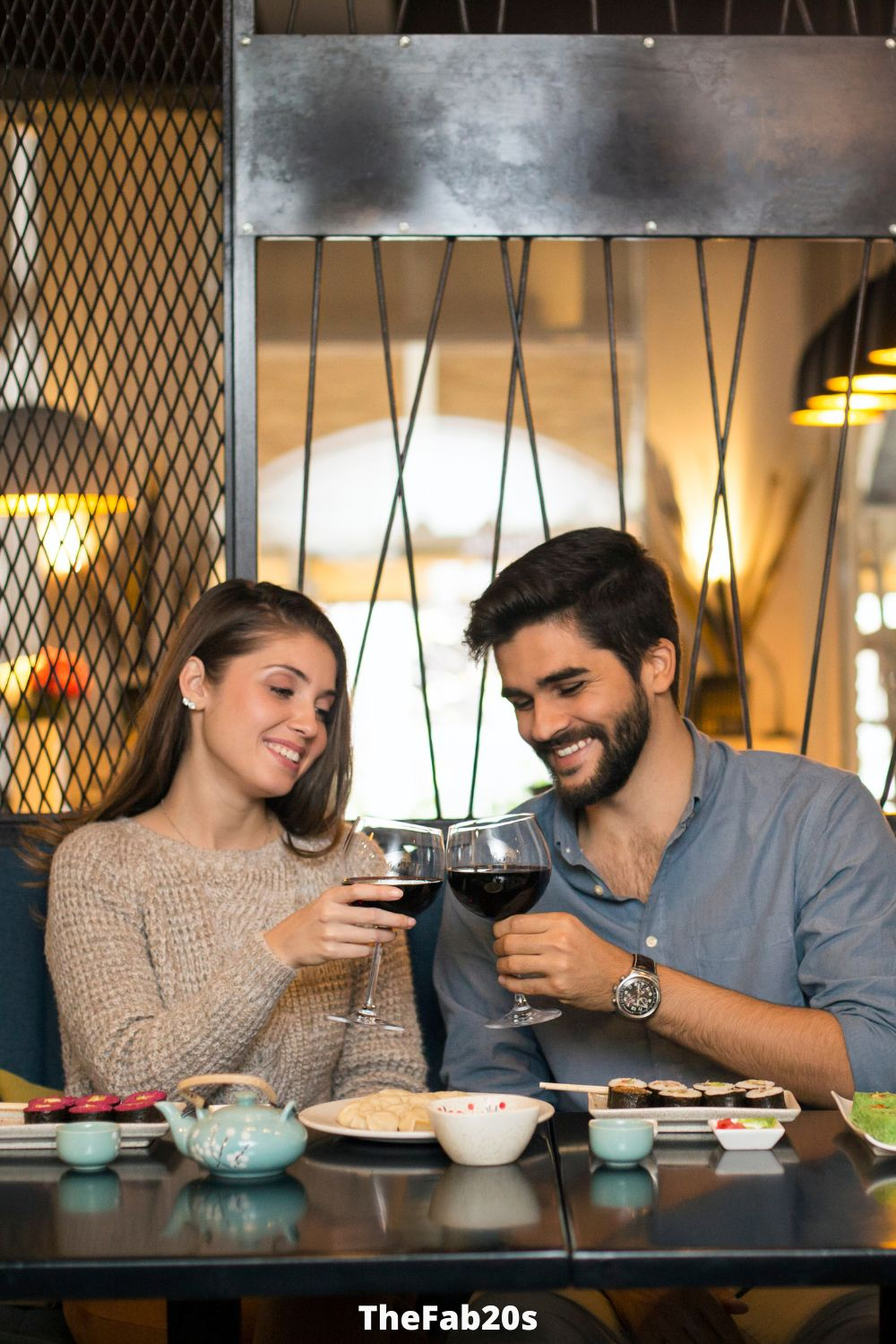 Man and woman on a date, drinking wine - Featured In Signs An Older Man Is Falling In Love With You