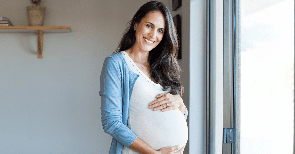 A pregnant woman happy with her choice of surrogacy route 