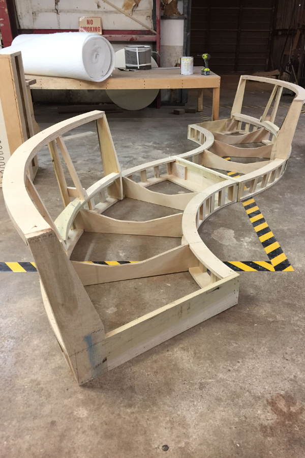 a custom furniture piece in a workshop