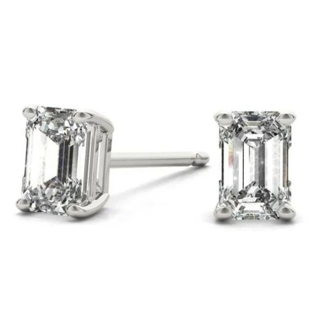 White gold emerald diamond stud earrings.