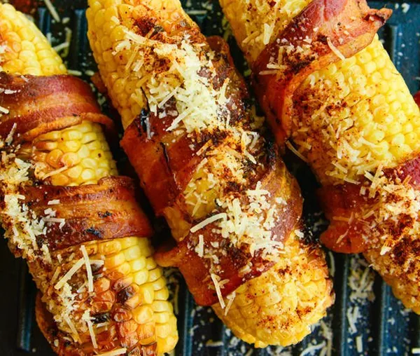 Bacon-Wrapped Corn on the Cob - A Savory Twist Topped with Parmesan Infusing Rich Flavor into Your Brisket Feast