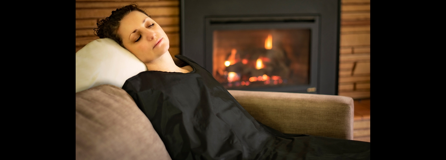 portable far infrared sauna blanket on the couch