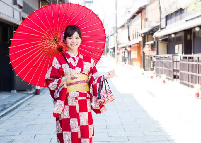Young woman wearing silk kimono