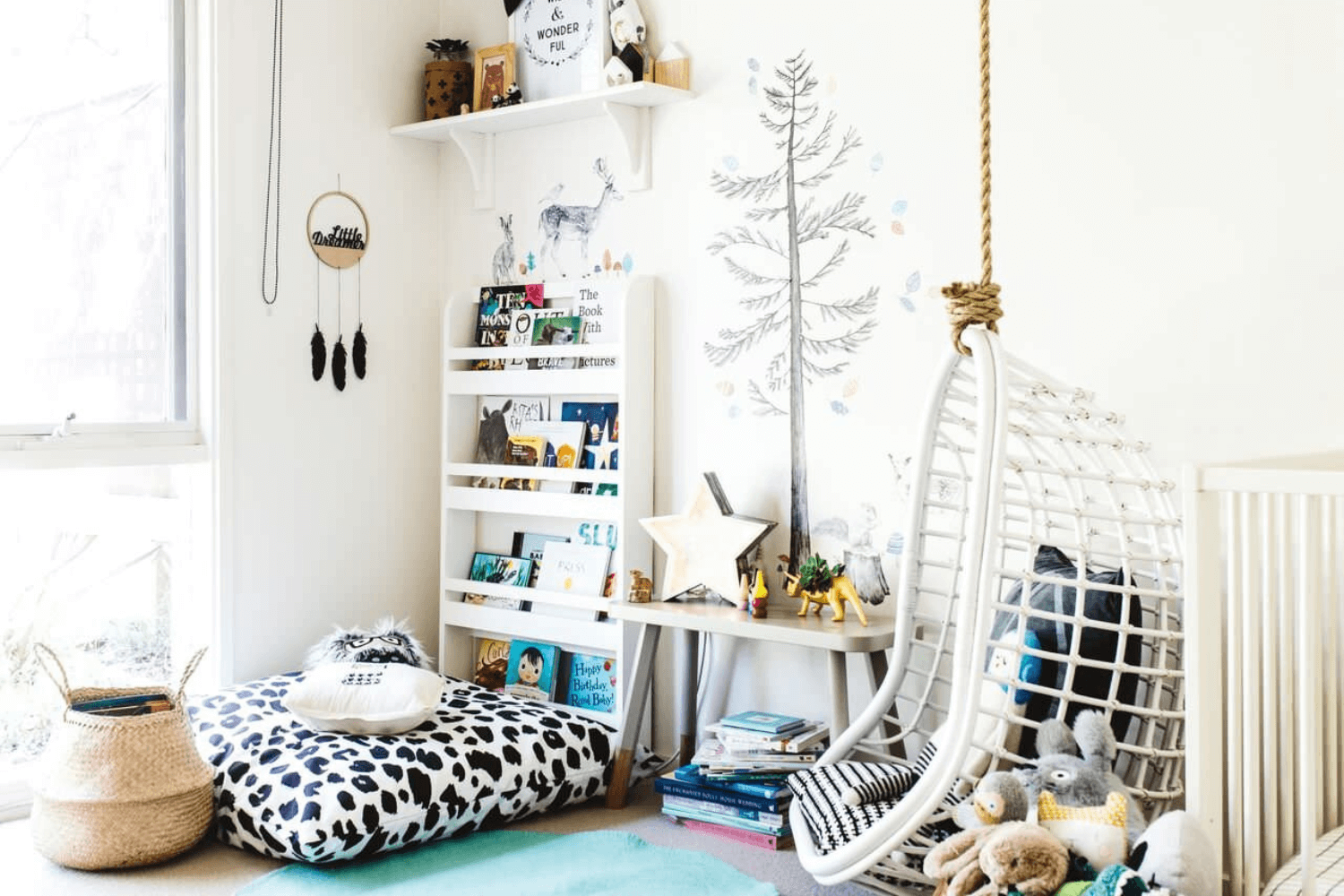 A cosy corner of kids bedroom with shelf and reading nook