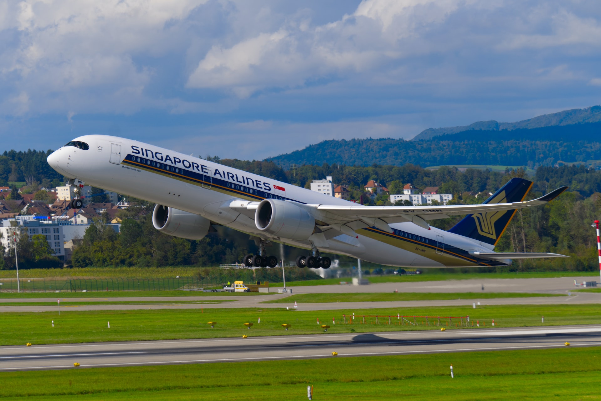 Singapore Airlines Airbus taking off from the runway.
