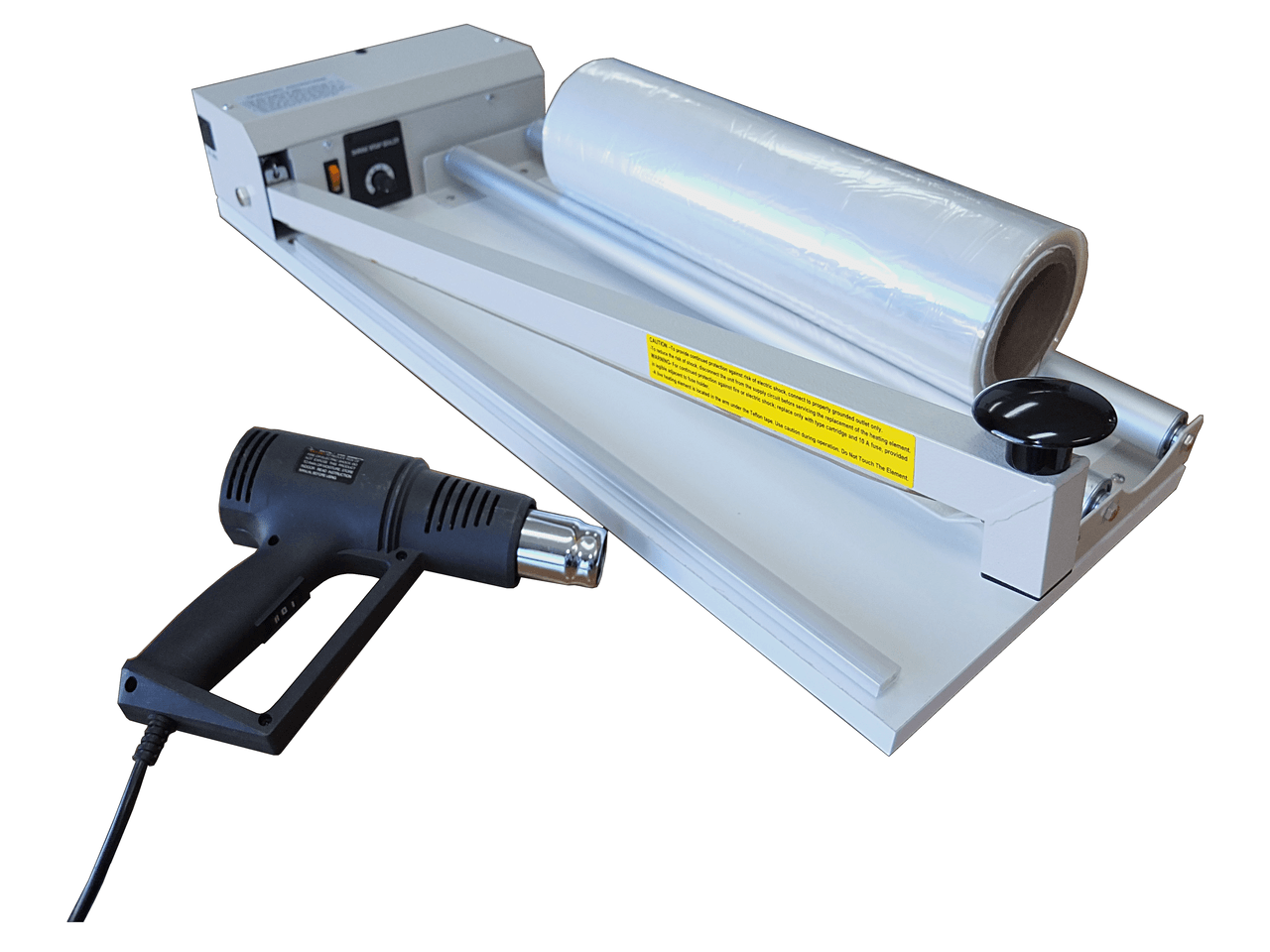 A roll of PVC shrink film with a heat gun in the background