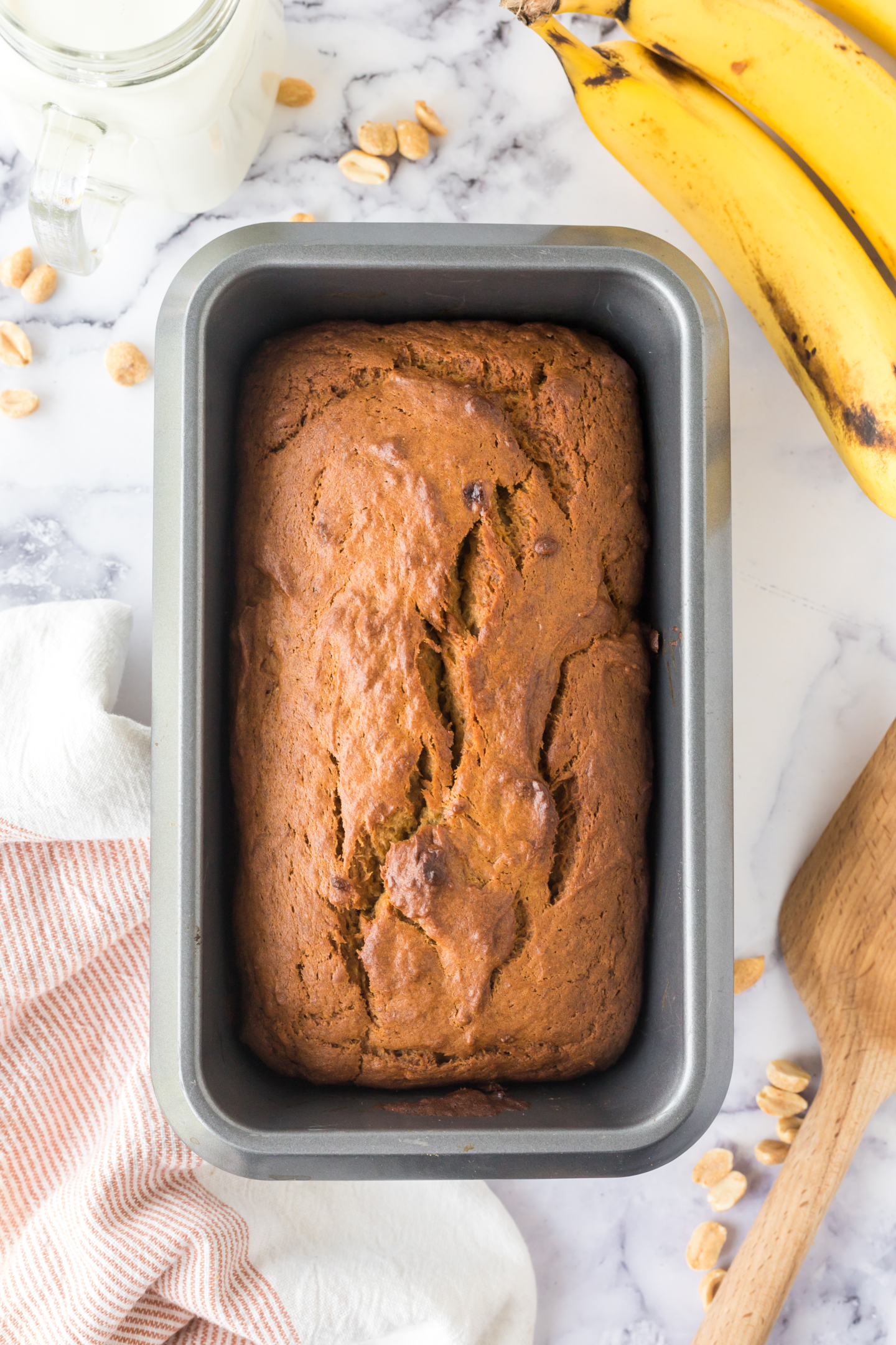 baked peanut butter banana bread in a loaf pan 