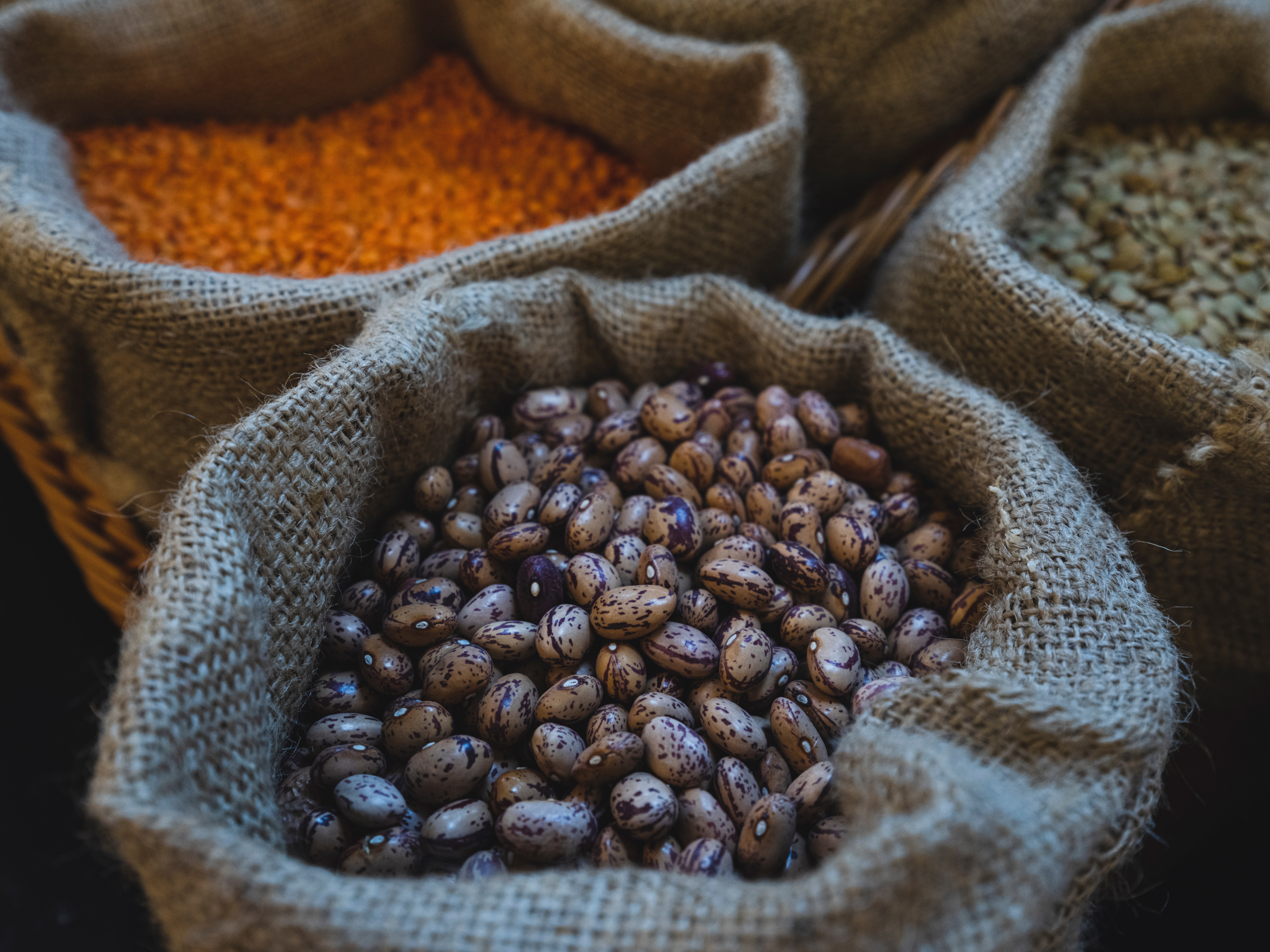 a close up of fresh legumes in the market