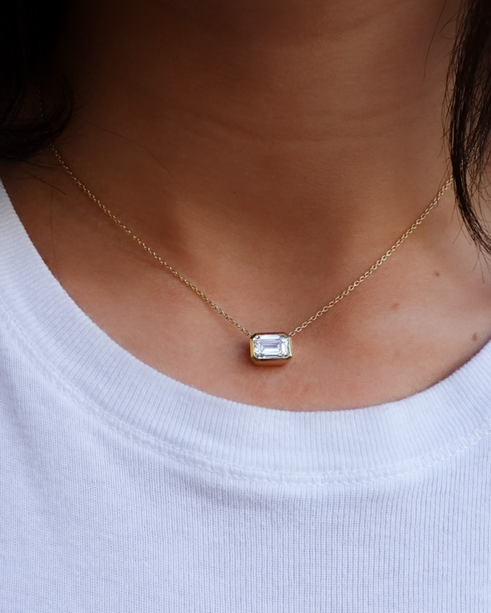 East West Bezel Pendant Necklace with Emerald Cut Diamond