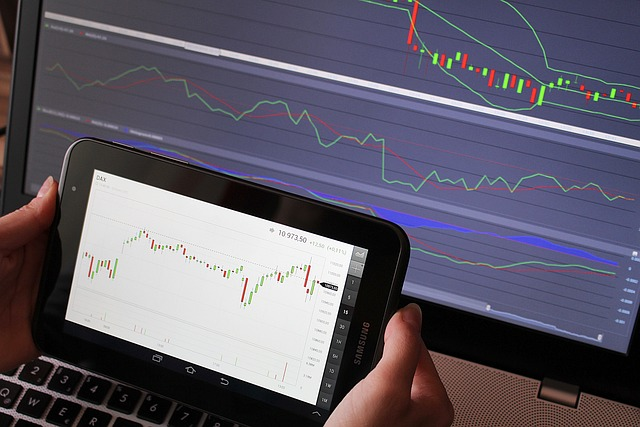 sales data on two screens representing how these business insights can create cross marketing opportunities