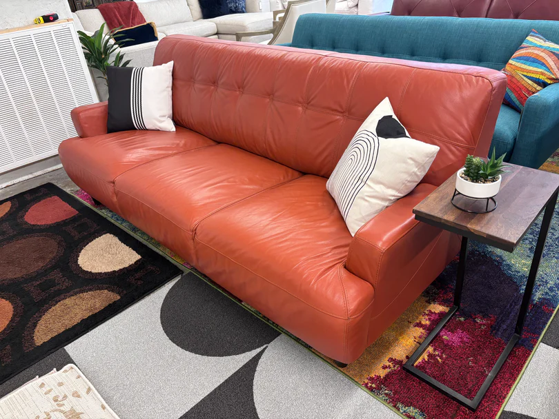 Different fabric samples laid out to help choose the right material for a sofa.