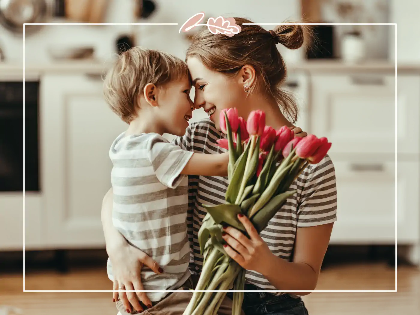 Mother and son holding tulips in the kitchen, fabulous flowers and gifts